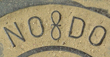 City crest on manhole cover